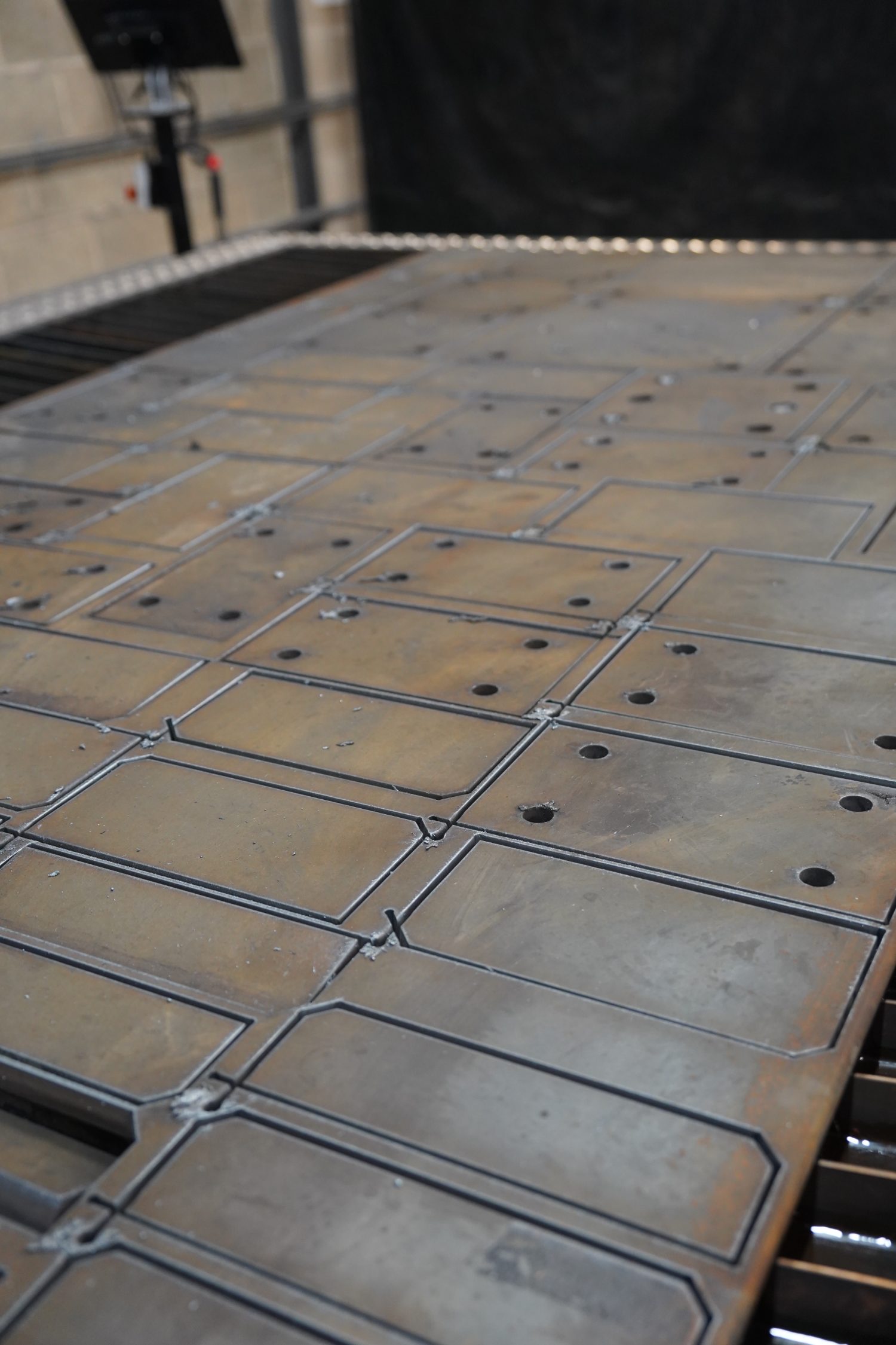 CNC plasma cut steel plate