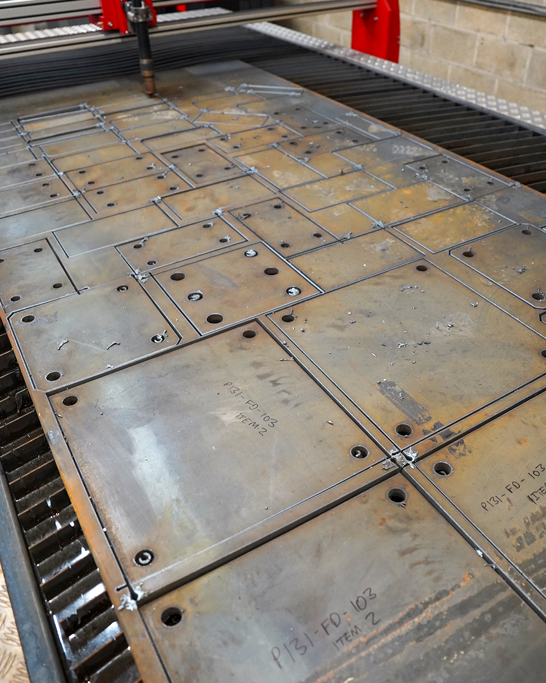 Fabricated steel bracket on the workshop floor