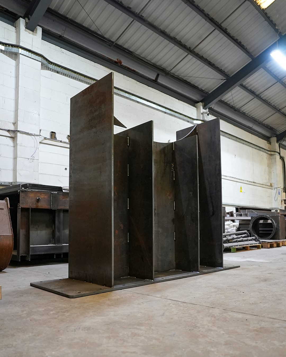 Welded heavy-plate assembly on the workshop floor