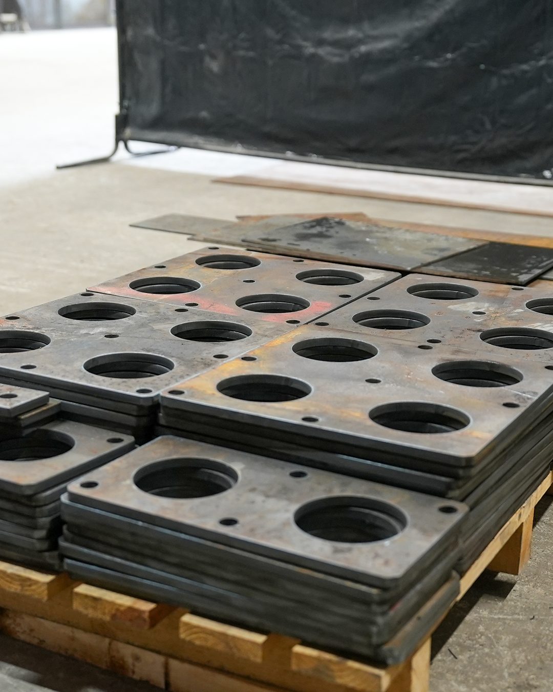 Finished plates checked and stacked for delivery