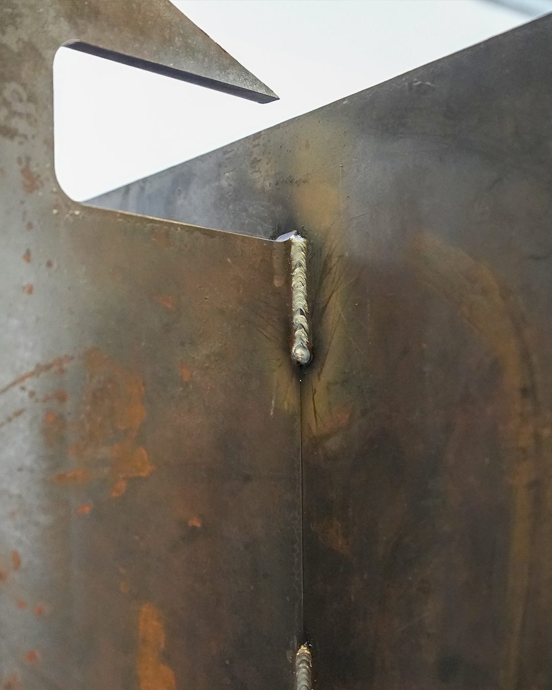 Weld detail at a plate corner
